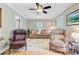 Bright living room with hardwood floors, ceiling fan, and comfortable seating perfect for relaxing or entertaining at 196 Dogwood Ridge Rd, Summerville, SC 29485