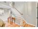Staircase with wood floors and white railing leading to the second floor at 196 Dogwood Ridge Rd, Summerville, SC 29485