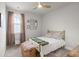 Comfortable bedroom with natural light, ceiling fan, and decorative wall art at 198 Steepbrook Dr, Summerville, SC 29486