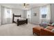 Bright bedroom featuring a wooden bed, large windows with bright light, and a ceiling fan at 198 Steepbrook Dr, Summerville, SC 29486