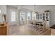 Bright dining room with large windows and stylish chandelier at 198 Steepbrook Dr, Summerville, SC 29486