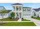 Charming two-story home with inviting front porch, balcony, and manicured lawn at 198 Steepbrook Dr, Summerville, SC 29486
