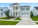 Charming two-story home with inviting front porch, balcony, and manicured lawn at 198 Steepbrook Dr, Summerville, SC 29486