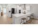Modern kitchen with white cabinets, quartz countertops, and stainless steel appliances at 198 Steepbrook Dr, Summerville, SC 29486