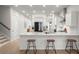 Modern kitchen with white cabinets, quartz countertops, and stainless steel appliances at 198 Steepbrook Dr, Summerville, SC 29486