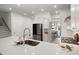 Modern kitchen with white cabinets, quartz countertops, and stainless steel appliances at 198 Steepbrook Dr, Summerville, SC 29486