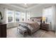 Comfortable main bedroom featuring lots of natural light, a ceiling fan, and a neutral color scheme at 198 Steepbrook Dr, Summerville, SC 29486