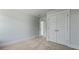Bedroom with an open door, closet and neutral carpet floors at 206 Terrace View Dr, Summerville, SC 29486