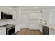 Updated kitchen with stainless steel appliances, quartz countertops, white cabinets, and modern hardware at 206 Terrace View Dr, Summerville, SC 29486