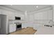 Well-lit kitchen featuring stainless appliances, white cabinets, subway tile backsplash, and plenty of storage at 206 Terrace View Dr, Summerville, SC 29486