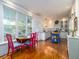 Inviting dining area with large windows and charming table with red chairs at 206 White Gables Dr, Summerville, SC 29483