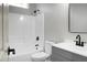 Bathroom featuring a shower-tub combo, neutral walls, and dark fixtures at 207 Thomaston Ave, Summerville, SC 29485