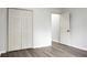 Bedroom featuring sleek floors, light gray walls, an open doorway and a closet with folding doors at 207 Thomaston Ave, Summerville, SC 29485