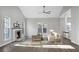Inviting living room with a cozy fireplace, wood floors, and neutral decor at 207 Thomaston Ave, Summerville, SC 29485