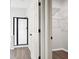 Walk-in closet with shelving, and a door leading to the bathroom at 207 Thomaston Ave, Summerville, SC 29485