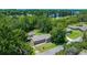 Aerial view of a single-Gathering home with a well-maintained lawn and above-ground swimming pool at 215 Hines Dr, Bonneau, SC 29431