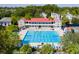 Aerial view showcasing a large swimming pool and clubhouse for community residents at 220 Ponsbury Rd, Mount Pleasant, SC 29464