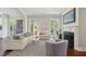 Comfortable living room featuring a fireplace, neutral decor, and access to outdoor spaces at 220 Ponsbury Rd, Mount Pleasant, SC 29464