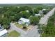Beautiful aerial captures the neighborhood with its proximity to the road and lush green surrounding creating a serene environment at 2218 Myrtle Ave, Sullivans Island, SC 29482