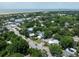Picturesque aerial showcases the coastal neighborhood, highlighting proximity to the beach, shops, and local attractions at 2218 Myrtle Ave, Sullivans Island, SC 29482