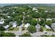 Scenic aerial view captures the neighborhood's serene atmosphere and convenient access to surrounding amenities and roadways at 2218 Myrtle Ave, Sullivans Island, SC 29482