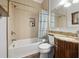 Bathroom with a vanity, a mirror, and a shower/tub at 2218 Myrtle Ave, Sullivans Island, SC 29482