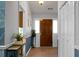 Welcoming foyer featuring a hardwood floor, stylish decor, and bright lighting, creating a great first impression at 2438 Hansard Dr, North Charleston, SC 29406