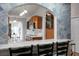 An arched opening from the counter offers a view of the adjacent kitchen and breakfast nook at 2438 Hansard Dr, North Charleston, SC 29406