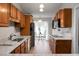 Well-maintained kitchen features ample counter space, stainless appliances, and views to the adjacent eating area at 2438 Hansard Dr, North Charleston, SC 29406