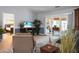 Comfortable living room with sliding glass doors to the lanai and views into an adjacent bedroom at 2438 Hansard Dr, North Charleston, SC 29406