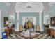 Elegant lobby with decorative columns, classic furnishings, and ample natural light creating a welcoming space at 2438 Hansard Dr, North Charleston, SC 29406