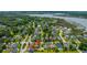 Desirable neighborhood aerial showcases lush landscaping, mature trees, community ponds, and convenient access to waterfront at 2800 River Vista Way, Mount Pleasant, SC 29466