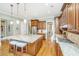 Modern kitchen features a center island with seating, stainless steel appliances, and custom cabinetry at 2800 River Vista Way, Mount Pleasant, SC 29466