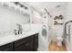 Modern bathroom featuring a glass-enclosed shower, a quartz countertop and a black faucet at 2942 Foxhall Rd, Charleston, SC 29414