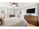 Primary bedroom features hardwood floors and two wooden dressers for ample storage space at 2942 Foxhall Rd, Charleston, SC 29414