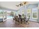 Bright sun room featuring a tiled floor and direct access to the outdoor pool at 2942 Foxhall Rd, Charleston, SC 29414