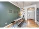 Inviting dining area with modern lighting, stylish decor, and beautiful hardwood floors, perfect for entertaining at 3012 Candela Grove Dr, Charleston, SC 29414