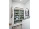 Hallway with a built in bookcase and tasteful decor at 3012 Candela Grove Dr, Charleston, SC 29414