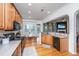 Open kitchen with wood cabinets, granite countertops and stainless steel appliances at 3012 Candela Grove Dr, Charleston, SC 29414