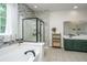 Luxurious main bathroom with soaking tub, glass shower, and double vanity at 3012 Candela Grove Dr, Charleston, SC 29414