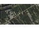 An aerial view displaying the location of the property relative to Maybank Highway and River Road at 3034 Maybank Hwy, Johns Island, SC 29455