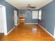 Open-concept living room featuring hardwood floors, a ceiling fan, and neutral paint at 3034 Maybank Hwy, Johns Island, SC 29455