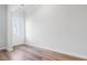 Bright room featuring neutral walls, elegant trim and hardwood flooring at 304 Torslanda Ln, Summerville, SC 29486