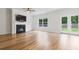 Bright room features neutral walls, elegant trim and hardwood flooring at 304 Torslanda Ln, Summerville, SC 29486