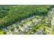 An aerial view shows the property in a neighborhood close to trees and community amenities at 311 Aberdeen Cir, Summerville, SC 29483