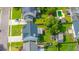 An aerial view shows the property with a beautiful lawn and a backyard with play equipment at 311 Aberdeen Cir, Summerville, SC 29483