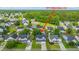 Residential neighborhood view highlighting this home with a lush lawn, garage, and mature trees at 311 Aberdeen Cir at 311 Aberdeen Cir, Summerville, SC 29483