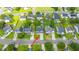 An aerial view pinpoints the property with a long driveway in a well-established neighborhood at 311 Aberdeen Cir, Summerville, SC 29483