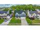 Stunning overhead view of a home with lush green lawn and an attached two-car garage in a lovely neighborhood at 311 Aberdeen Cir, Summerville, SC 29483