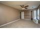 Spacious bedroom with a ceiling fan, closet and window with natural light at 311 Aberdeen Cir, Summerville, SC 29483
